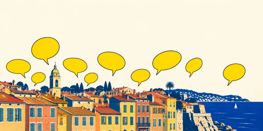 Bulles de dialogue jaunes au-dessus des toits et de la mer, sur la Côte d’Azur